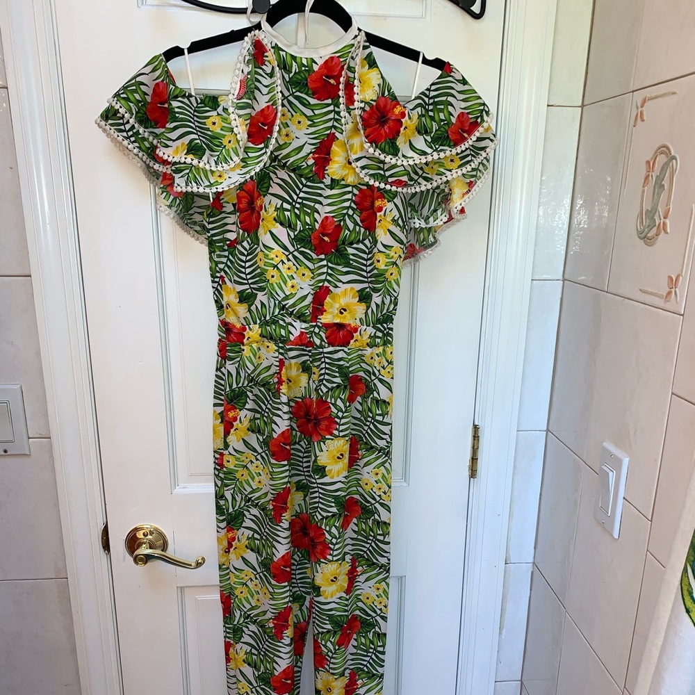 XOXO Tropical print ruffle cold shoulder , tie back jumpsuit.